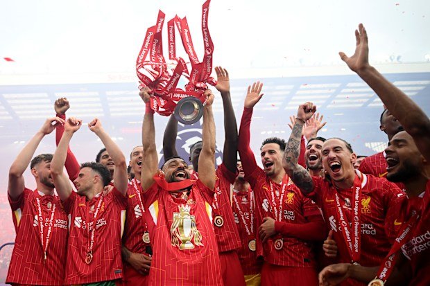 Liverpool celebrates winning the 2024-25 Premier League trophy.