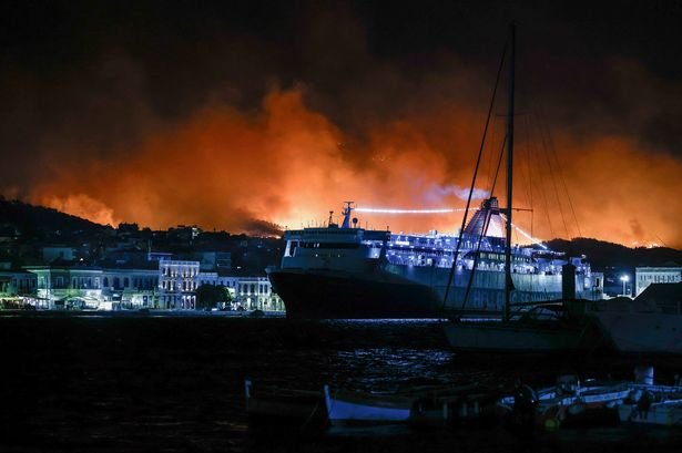 Fire outside Chios town as seen from the main port on June 22, 2025. (Photo by Dimitris Tosidis / SOOC via AFP) (Photo by DIMITRIS TOSIDIS/SOOC/AFP via Getty Images)
