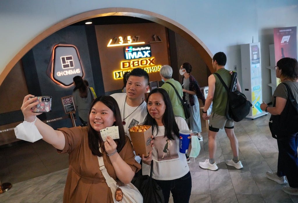 Movie-goers take a wefie before watching a film at Golden Harvest MegaBox in Kowloon Bay, on the cinema’s final day of operation on June 9. Photo: May Tse