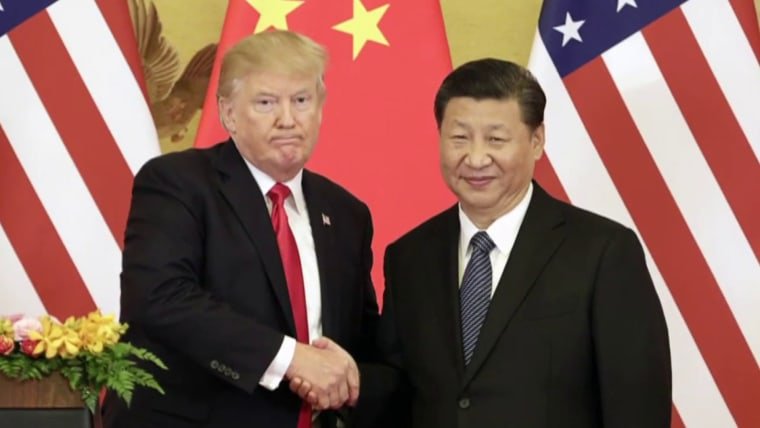 Trump says he will travel to China 