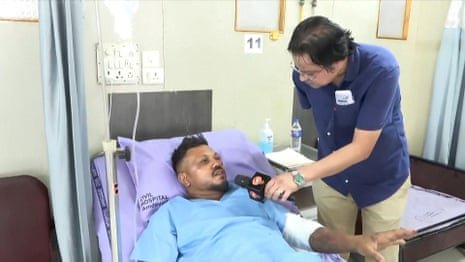 ‘I saw people dying in front of my eyes’: British survivor describes Air India crash – video