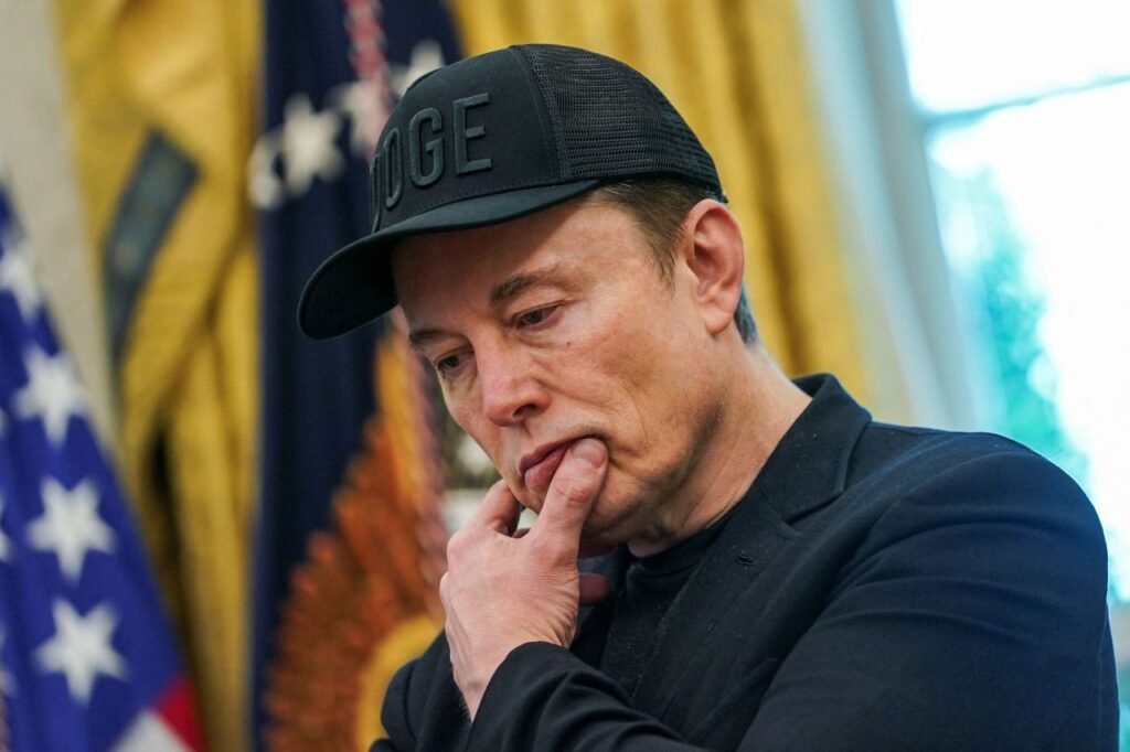 Elon Musk reacts during a press conference at the White House in Washington, DC, on May 30.
