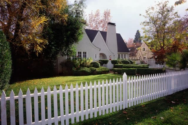 Getty House surrounded by white fence (stock image)