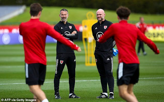 Liverpool have appointed former Wales manager Rob Page (right) as their new Under-21 boss