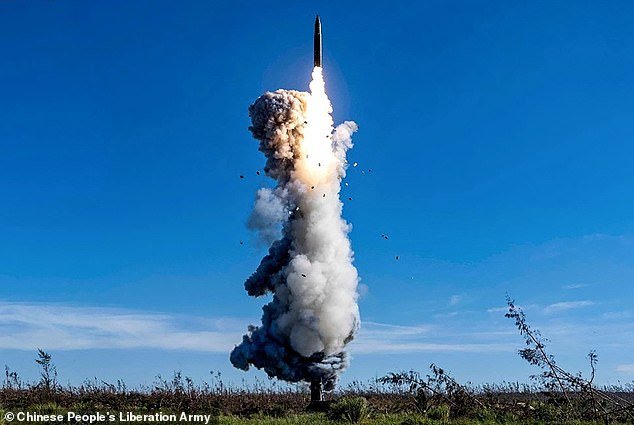 China 's space-based military technology is developing 'breathtakingly fast' with US forces at risk of the 'kill chain', Washington has warned (pictured: the Chinese People's Liberation Army Rocket Force launching an intercontinental ballistic missile carrying a dummy warhead into the Pacific Ocean)