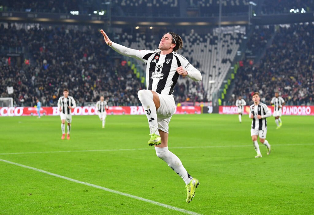 TURIN, ITALY - DECEMBER 17: Dusan Vlahovic of Juventus celebrates scoring his team's first goal during the Coppa Italia match between Juventus FC and Cagliari Calcio at Allianz Stadium on December 17, 2024 in Turin, Italy. (Photo by Valerio Pennicino/Getty Images)