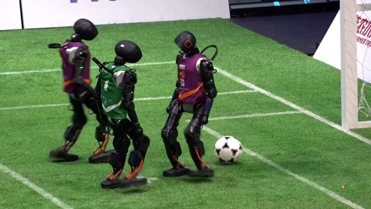 Humanoid robots play soccer in China