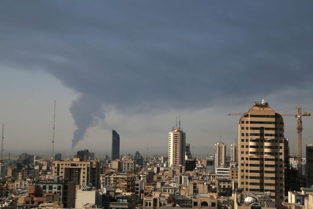 Huge smoke rises up from an oil facility facility after it appeared to have been hit by an Israeli strike Saturday in southern Tehran.