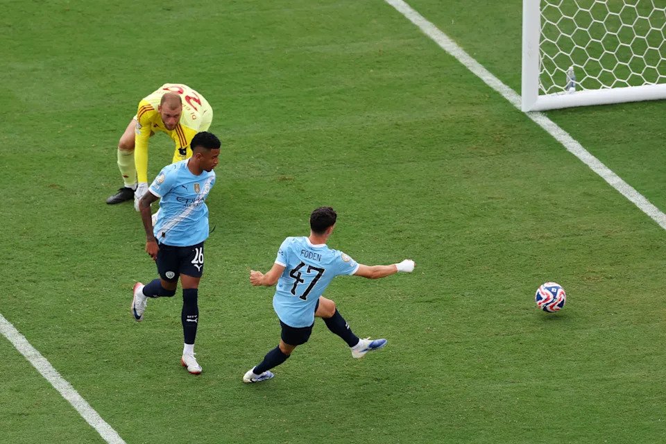 ORLANDO, FLORIDA - JUNE 26: Phil Foden #47 of Manchester City scores his team's fourth goal during the FIFA Club World Cup 2025 group G match between Juventus FC and Manchester City FC at Camping World Stadium on June 26, 2025 in Orlando, Florida. (Photo by Megan Briggs/Getty Images)