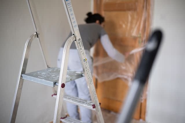 Getty Woman doing home renovation (stock image)