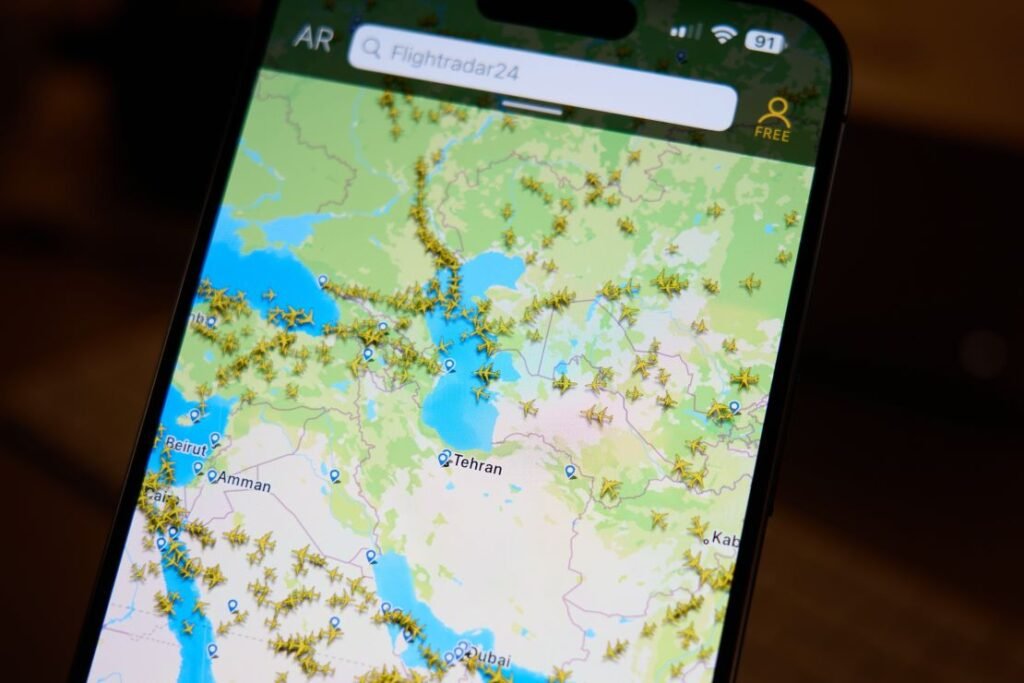 The Flightradar24 app shows commercial flights avoiding the airspace over Iran.