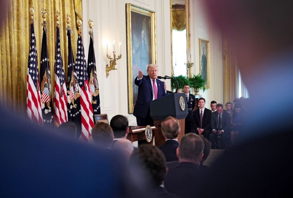 President Donald Trump takes questions in the East Room of the White House on Thursday.
