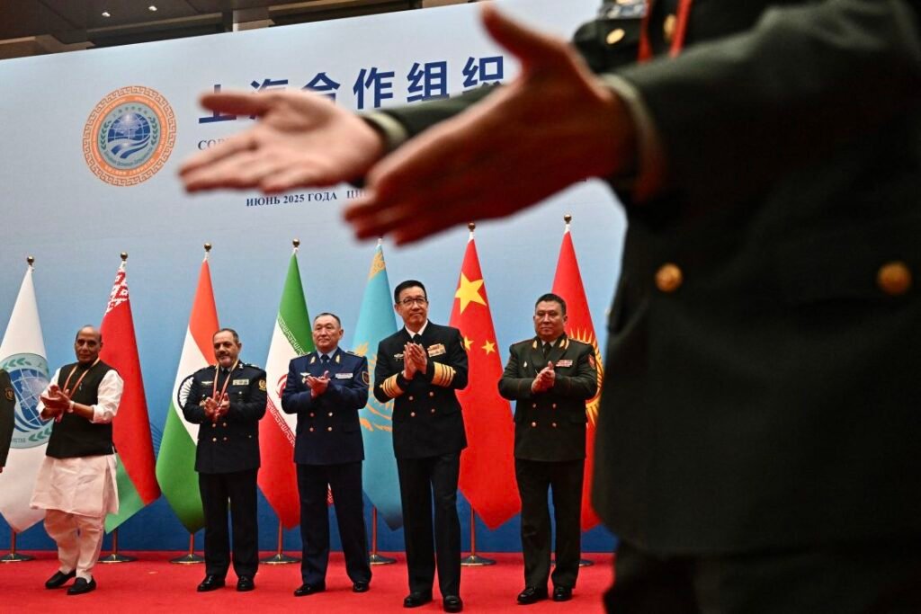 Defense ministers including China's Dong Jun (second from right) gather for a group photo during the SCO defense minister's meeting on Wednesday.