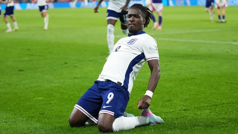 Jonathan Rowe slides on his knees in celebration after putting England 3-2 up against Germany in extra-time of the U21 Euro final