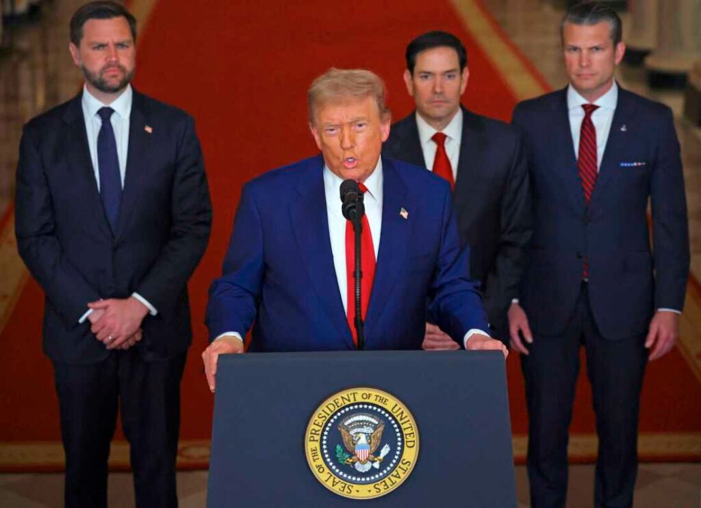 President Trump addresses the nation, alongside (from left) Vice President Vance, Secretary of State Marco Rubio and Secretary of Defense Pete Hegseth, from the White House on Saturday.