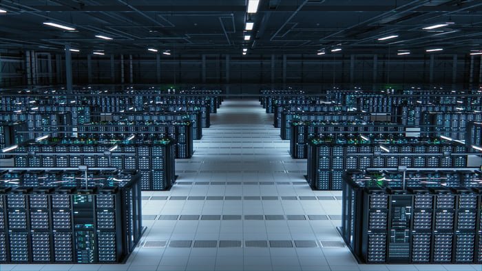 Server racks housing GPU clusters in an AI data center.