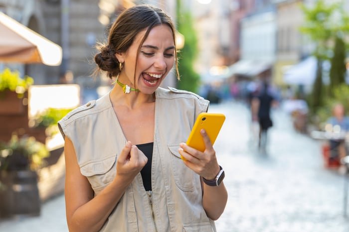 Person looking at phone.