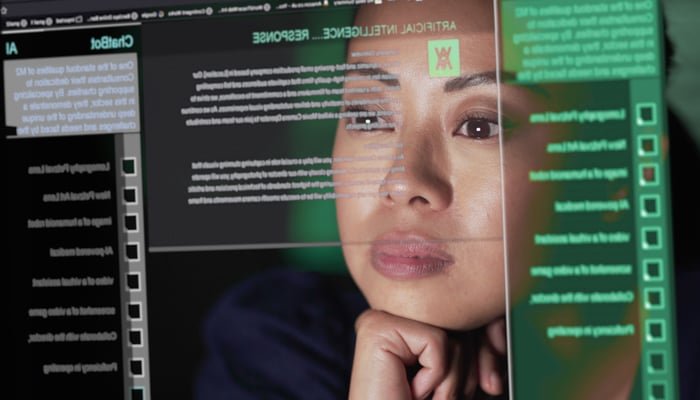 A tech analyst watching a screen.