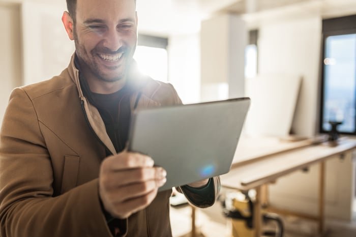 A person using a tablet.