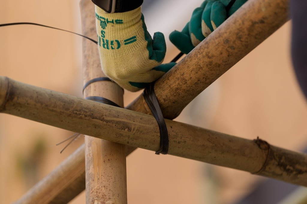 Workers erect Hong Kong’s bamboo scaffolding installation at this year’s Venice Biennale of Architecture. Photo: Oliver Law