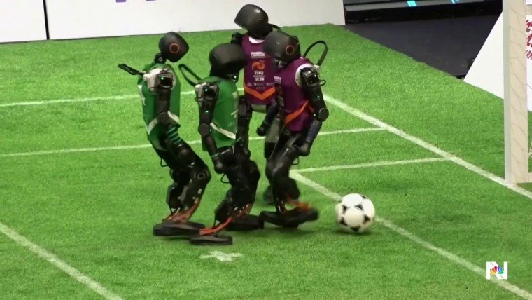 Chinese AI robots compete in first ever soccer match