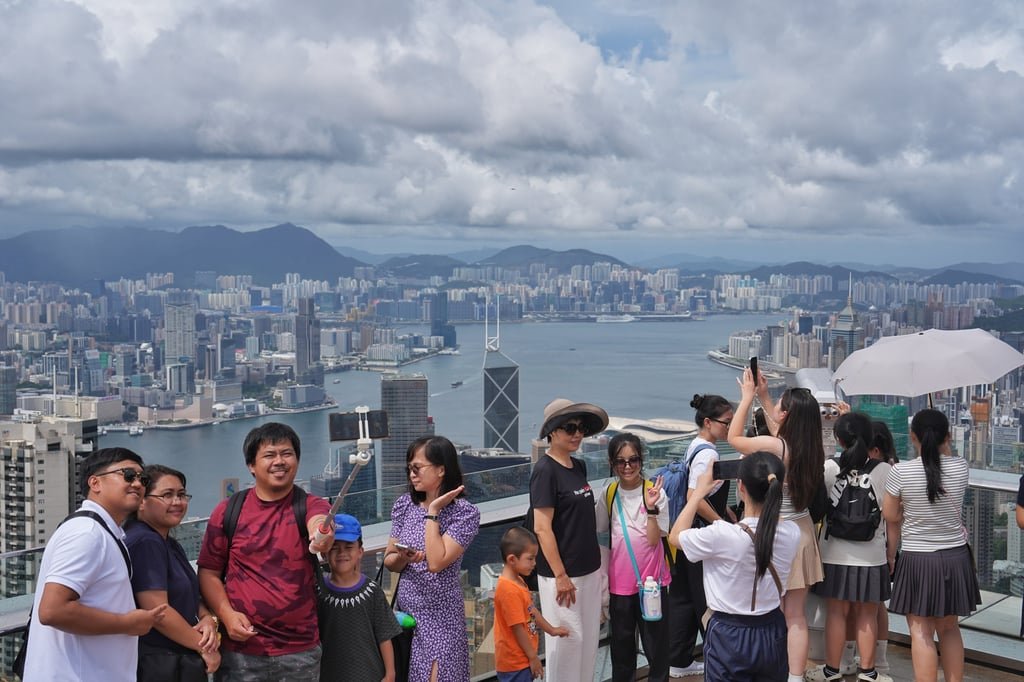 Tourists at the Observation Deck of the Peak Tower. Photo: Elson Li