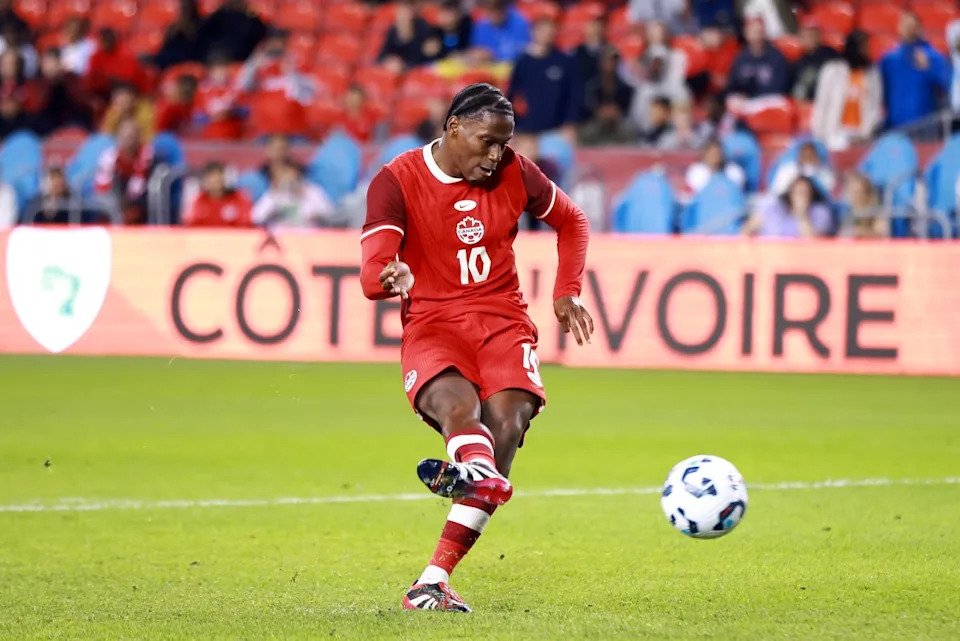 TORONTO, ON - JUNE 10: Jonathan David #10 of Canada scores in a penalty shootout during an International Friendly against Ivory Coast at BMO Field on June 10, 2025 in Toronto, Ontario, Canada. (Photo by Vaughn Ridley/Getty Images)