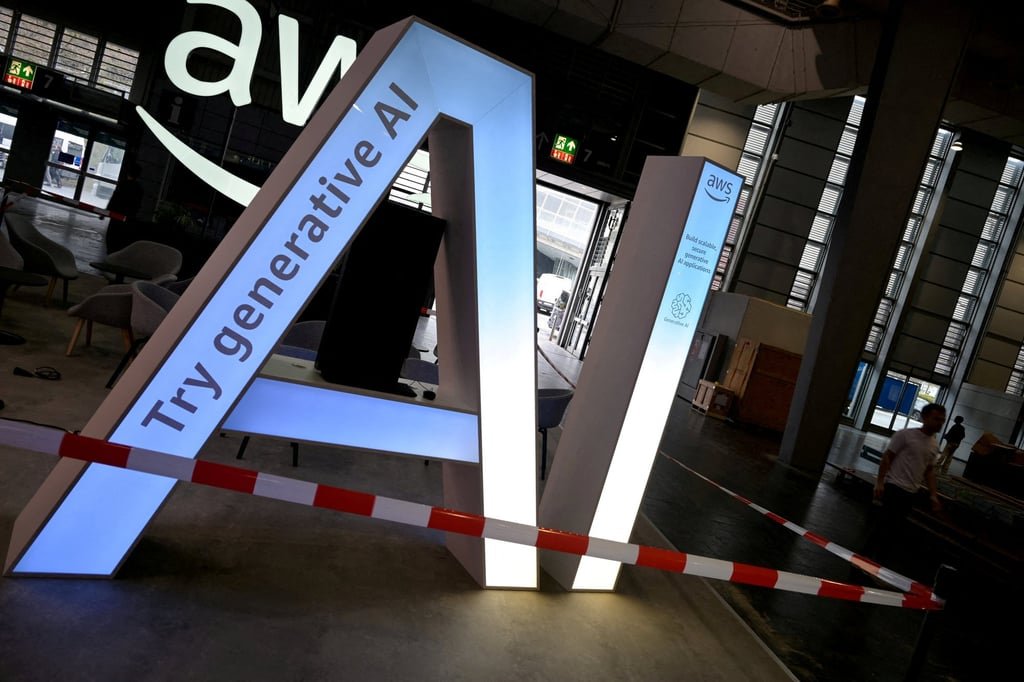 The letters AI seen at the booth of AWS ahead of the opening of Hannover Messe, in Germany, March 30, 2025. Photo: Reuters