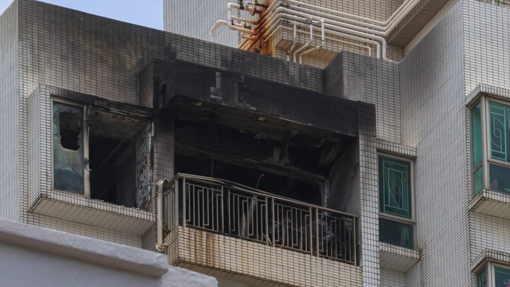 Man found dead on balcony of Hong Kong flat in aftermath of blaze