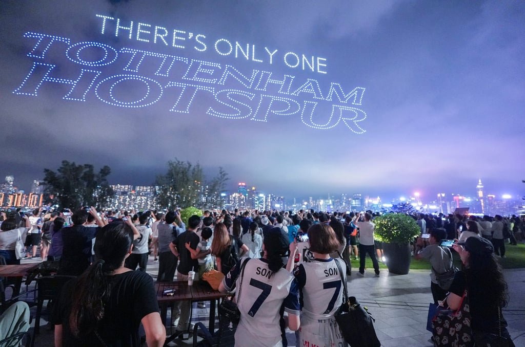 Crowds enjoy a Tottenham-themed drone show over Hong Kong’s harbour on Wednesday. Photo: Eugene Lee