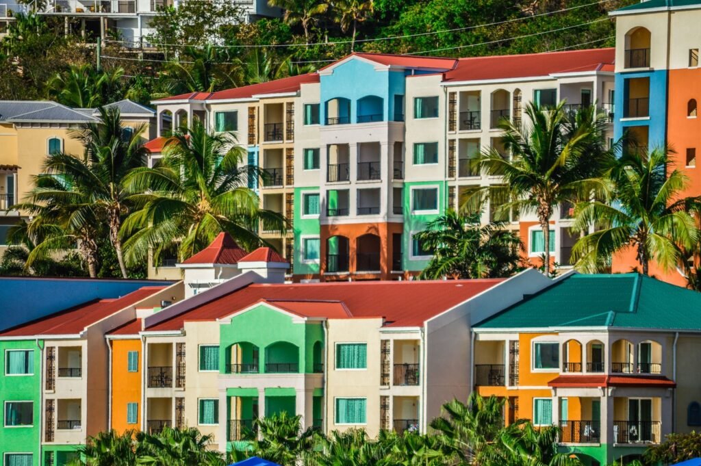 Two rows of colorful residential buildings.