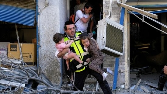 Iran struck Israel with missiles and drones while Israel said it attacked “regime targets and government repression bodies in the heart of Tehran.”(AP file)