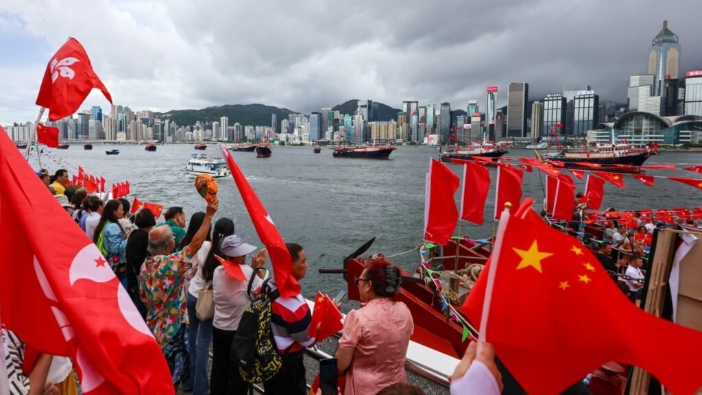 Hong Kong residents and tourists revel in handover anniversary festivities