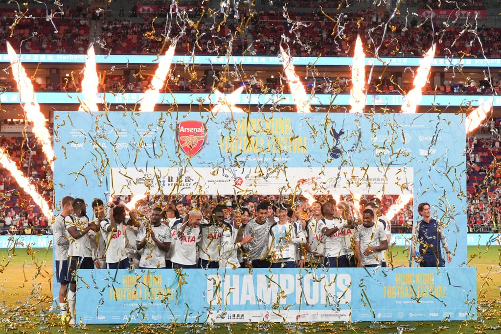 Tottenham players celebrate beating Arsenal in the Herbalgy Trophy at Kai Tak Stadium. Photo: Sam Tsang