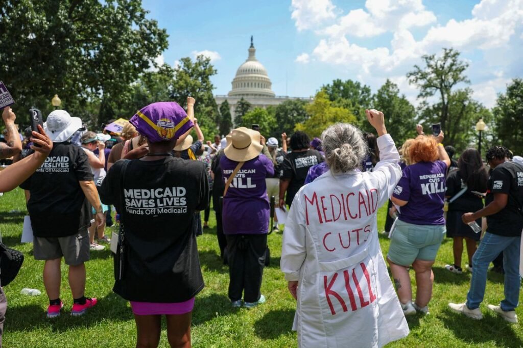 Workers with the Service Employees International Union rally outside the US Capitol on June 26 in Washington, DC.