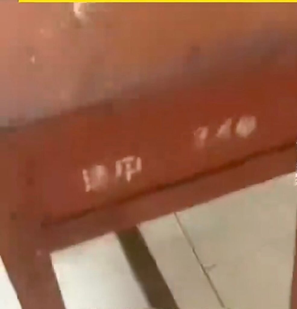 The old desk was marked with Chinese characters, which Shen immediately recognised. Photo: Douyin
