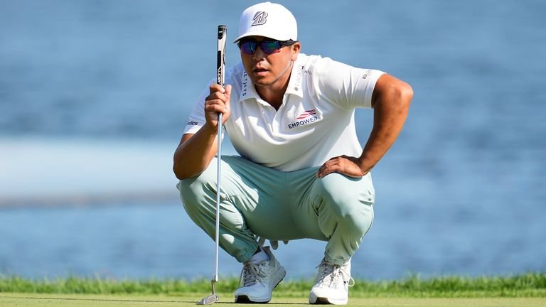 Kurt Kitayama lines up a putt on the 18th green during the final round of the 3M Open