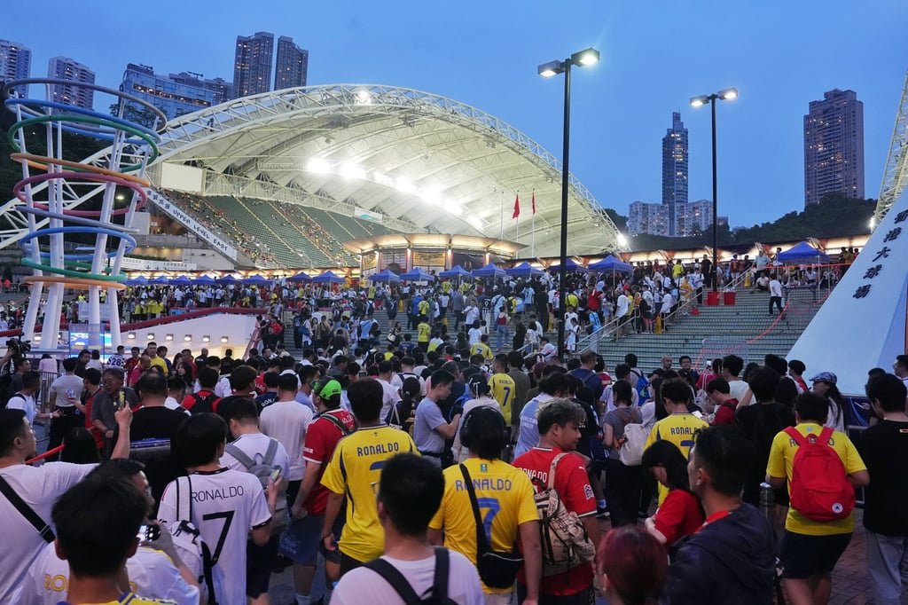 Football fans enter Hong Kong Stadium for the Saudi Super Cup match on Tuesday. Photo: Elson Li