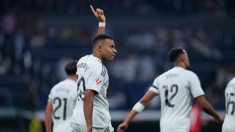 Real Madrid's Kylian Mbappe celebrates after scoring from a penalty...