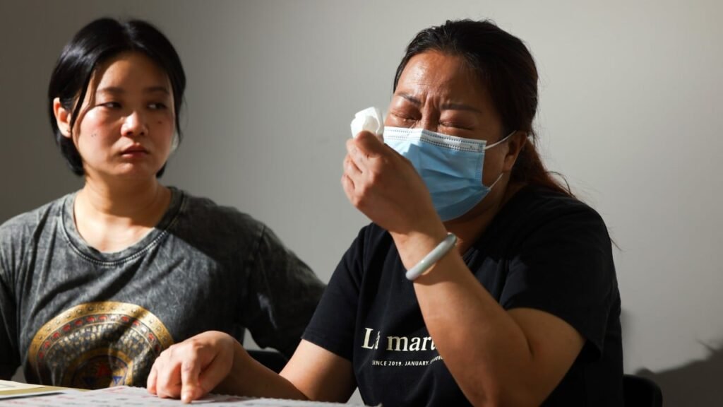 Widow of Hong Kong repairman who died after working 59 hours plans legal action