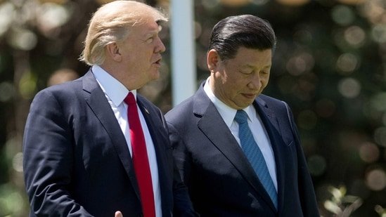 US President Donald Trump (L) and Chinese President Xi Jinping (R)(AFP)