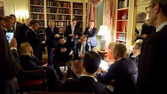 Ukrainian President Volodymyr Zelenskiy speaks with French President Emmanuel Macron, German Chancellor Friedrich Merz, Britain's Prime Minister Keir Starmer, European Commission's President Ursula von der Leyen, Italian Prime Minister Georgia Meloni, Finland's President Alexander Stubb and NATO's Secretary General Mark Rutte, at the White House Library, in Washington, D.C., (via REUTERS)