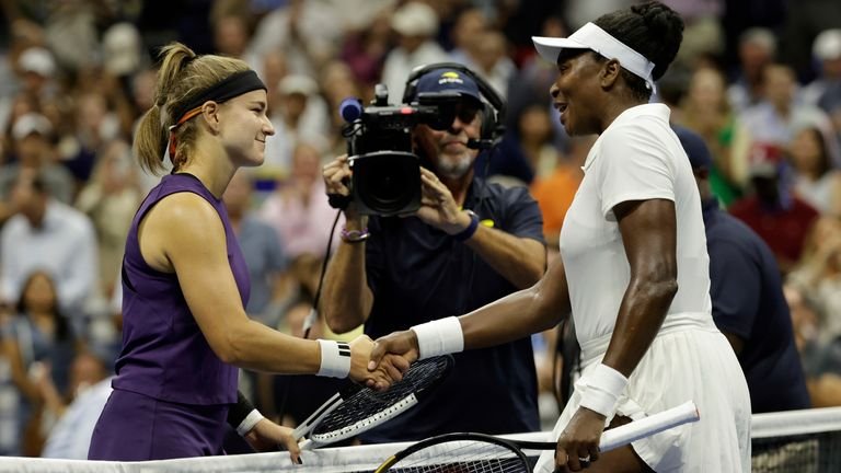 Karolina Muchova, of the Czech Republic, shakes hands with Venus Williams, of the United States, during the first round of the U.S. Open ten