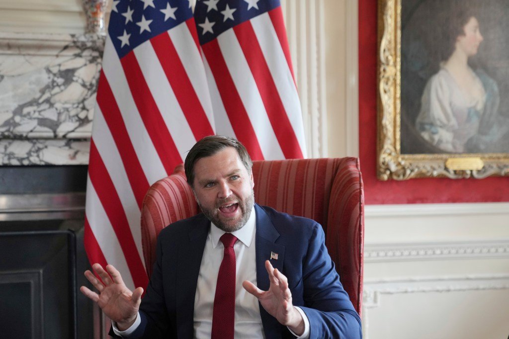 JD Vance speaking during a meeting.