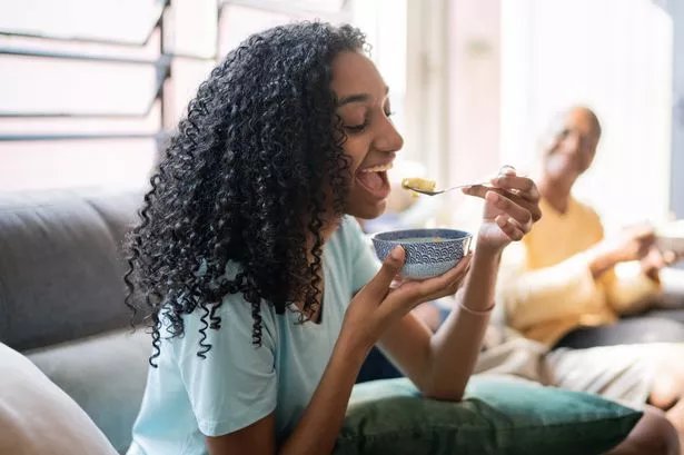 Girl eating soup