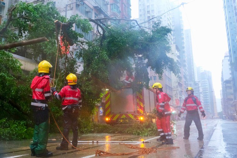 Image: hong kong firemen typhoon ragasa