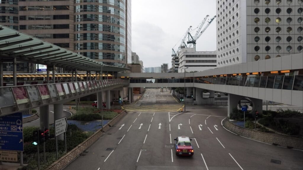 Hong Kong stocks rise on China stimulus bets amid typhoon trading