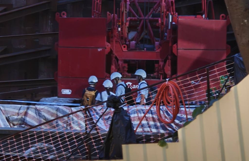 The woman was freed by emergency personnel, but later died at the hospital. Photo: Handout