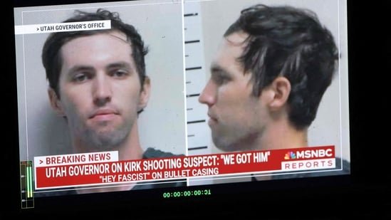 A TV monitor displays a picture of Tyler Robinson, the suspected of killing Charlie Kirk on September 11.(AFP)