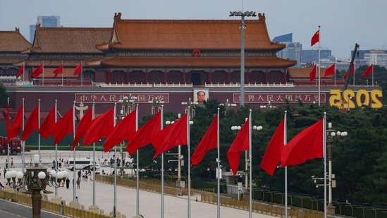 Flags flutter near Tiananmen Square ahead of the 80th anniversary of the end of World War Two, on Qianmen Street in Beijing, China, August 26, 2025. REUTERS/Tingshu Wang(REUTERS)